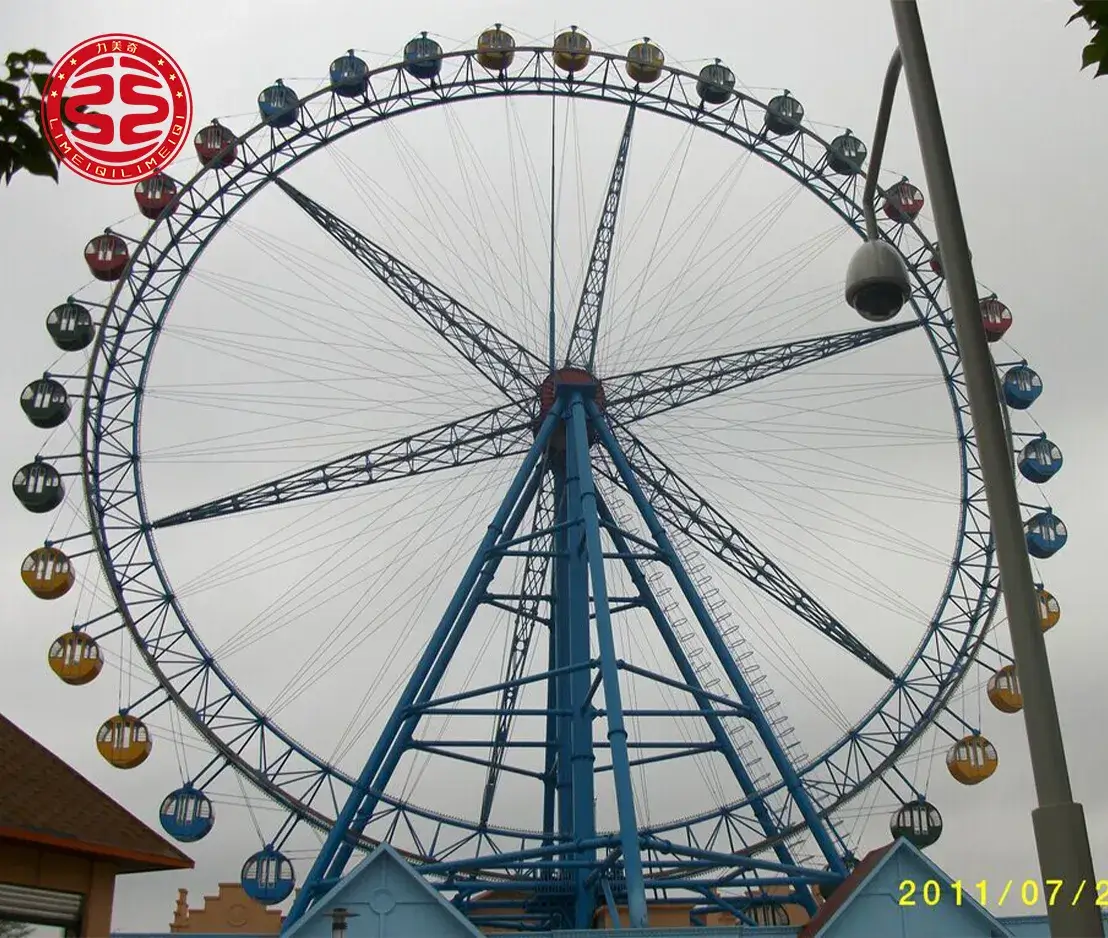 49m observation wheel scenic landscape 49m classic observation wheel ride against a blue sky with a scenic landscape and mountain background